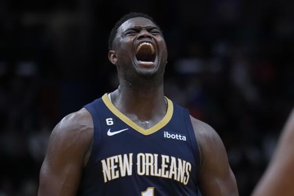 New Orleans Pelicans forward Zion Williamson (1) reacts after being fouled on a 3-point play in the second half of an NBA basketball game against the Minnesota Timberwolves in New Orleans, Wednesday, Dec. 28, 2022. Williamson scored a career high 43 points and the Pelicans won 119-118. (AP Photo/Gerald Herbert)