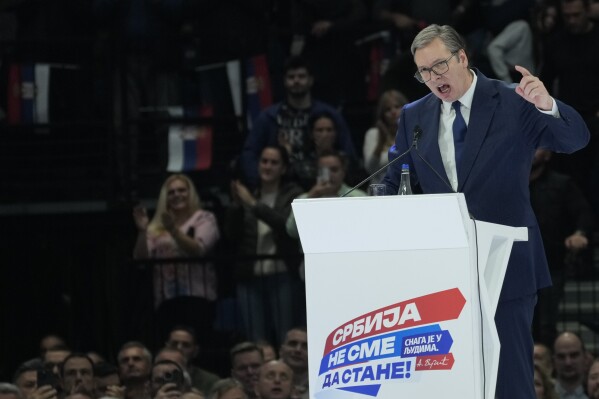 Serbian President Aleksandar Vucic speaks during a pre-election rally of his ruling Serbian Progressive Party in Belgrade, Serbia, Saturday, Dec. 2, 2023. When Serbia formally opened membership negotiations with the European Union, back in 2014, it was a moment of hope for pro-Western Serbs, eager to set their troubled country on an irreversible path to democratization. Those days are long gone. Now, they feel betrayed, both by the government and the EU. (AP Photo/Darko Vojinovic)