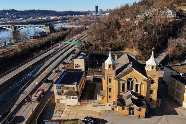 St. Nicholas Croatian Catholic Church, home to murals by Maxo Vanka, sits next to the Allegheny River in Millvale, Pa., Feb 13, 2025. (AP Photo/Gene J. Puskar)