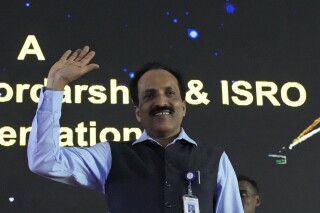 FILE- Indian Space Research Organization (ISRO) Chairman S. Somanath arrives to address the media after the successful landing of spacecraft Chandrayaan-3 on the moon, in Bengaluru, India, Wednesday, Aug. 23, 2023. India successfully carried out Saturday, Oct. 21, the first of a series of key test flights after overcoming a technical glitch ahead of its planned mission to take astronauts into space by 2025, Somanath said. (AP Photo/Aijaz Rahi, File)