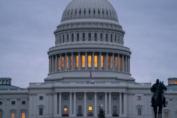 
              The Capitol is seen under early morning gray skies in Washington, Thursday, Dec. 20, 2018. The Senate approved legislation to temporarily fund the government late last night, a key step toward averting a federal shutdown after President Donald Trump backed off his demand for money for a border wall with Mexico.  The House is expected to vote before Friday's deadline, when funding for a portion of the government expires. Without resolution, more than 800,000 federal workers would face furloughs or be forced to work without pay, disrupting government operations days before Christmas.  (AP Photo/J. Scott Applewhite)
            