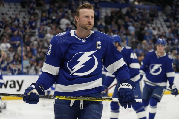 FILE - Tampa Bay Lightning center Steven Stamkos (91) skates before Game 3 of an NHL hockey Stanley Cup first-round playoff series against the Toronto Maple Leafs, Saturday, April 22, 2023, in Tampa, Fla. Lightning captain Steven Stamkos says he is disappointed about the lack of discussions with the team about a new contract as players report for training camp. Stamkos' current $68 million, eight-year deals ends after the upcoming season. (AP Photo/Chris O'Meara, File)