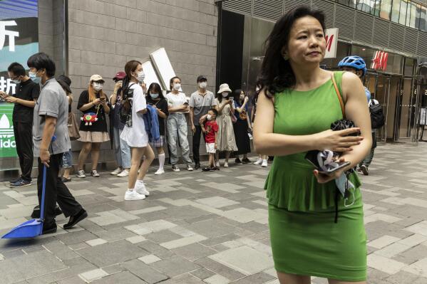 FILE - Cheng Lei, a Chinese-born Australian journalist for CGTN, the English-language channel of China Central Television, attends a public event in Beijing on Aug. 12, 2020. In 2022, Chinese-born Australian journalist Cheng Lei was tried in China on national security charges but has yet to learn the verdict, Australian Foreign Minister Penny Wong said in March. (AP Photo/Ng Han Guan, File)