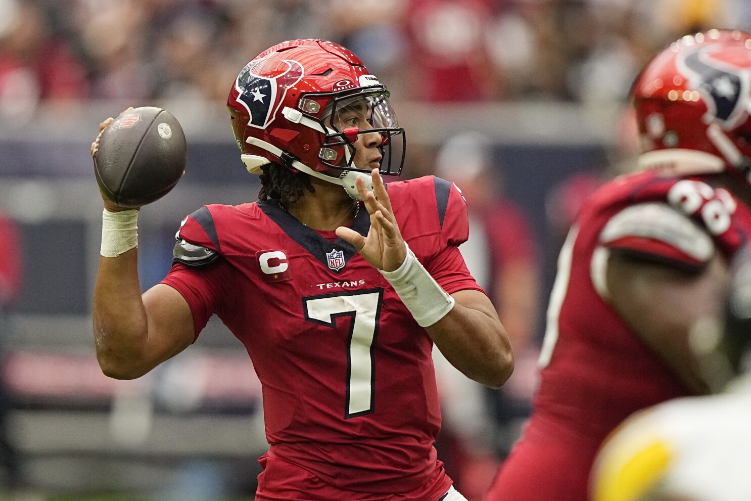 Texans' C.J. Stroud is off to a sizzling start as several other NFL rookie  QBs struggle | AP News