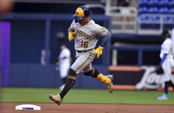 Milwaukee Brewers' Tyrone Taylor rounds first base after hitting a