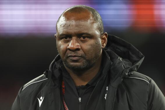 Crystal Palace's manager Patrick Vieira walks from the pitch at halftime during a pre-season game between Manchester United and Crystal Palace at the Melbourne Cricket Ground in Melbourne, Australia, Tuesday, July 19, 2022. (AP Photo/Asanka Brendon Ratnayake)