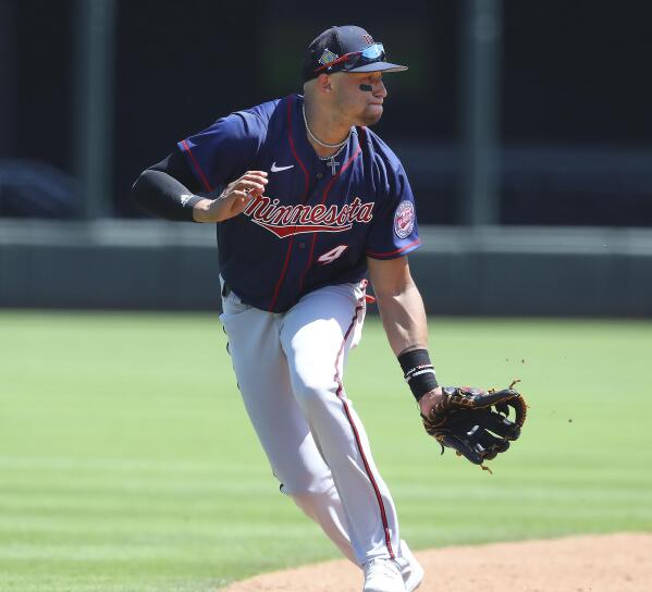 Shortstop goes for ground ball, second baseman goes for ground