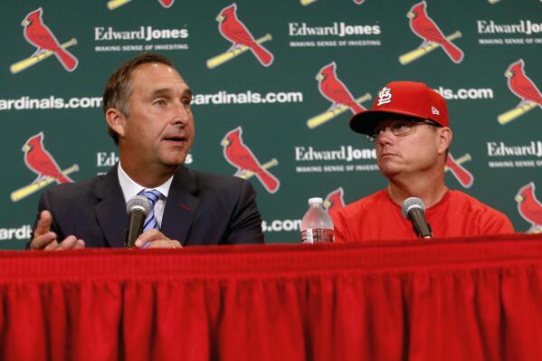 FILE - St. Louis Cardinals President of Baseball Operations John Mozeliak, left, answers questions after the team announced Mike Shildt, right, as manager, at Busch Stadium in St. Louis.,in this Tuesday, Aug. 28, 2018, file photo. The Cardinals fired former National League manager of the year Mike Shildt over organizational differences Thursday, Oct. 14, 2021, just one week after St. Louis lost to the Los Angeles Dodgers on a walk-off homer in the wild-card game. Mozeliak said the firing  was “something that popped up recently,” but he refused to expand on what he called “philosophical differences” between Shildt, the coaching staff and the front office. (Christian Gooden/St. Louis Post-Dispatch via AP, File)
