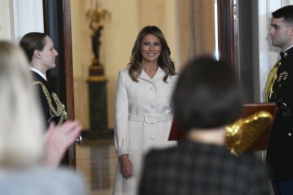 First lady Melania Trump arrives to speak during the Governors' Spouses' luncheon in the Blue Room of the White House in Washington, Monday, Feb. 10, 2020. (AP Photo/Susan Walsh)