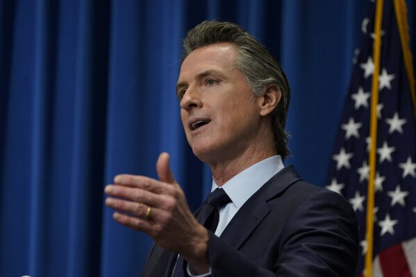 FILE — In this Jan. 8, 2021 file photo California Gov. Gavin Newsom outlines his 2021-2022 state budget proposal during a news conference in Sacramento, Calif. On Monday, Jan. 25, 2021 Newsom and Assembly Speaker Anthony Rendon and Senate President Pro Tem Tempore Toni Atkins announced a proposal that would extend pandemic eviction protections through the end of June and pay up to 80% of some tenants' unpaid rent. The proposal must still be approved by the state Legislature. (AP Photo/Rich Pedroncelli, File, Pool)