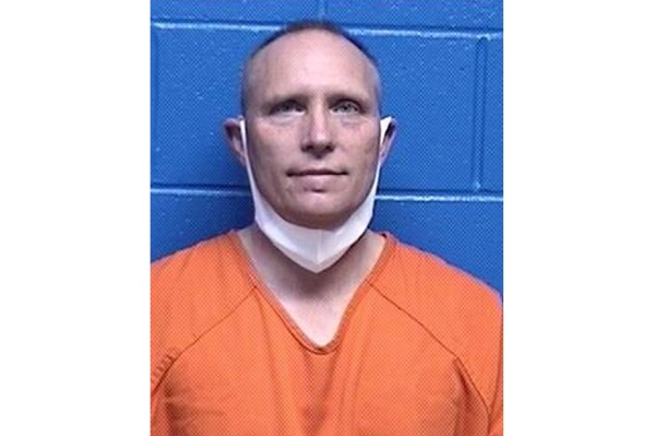 FILE - This booking photo released by the Missoula County, Mont., Detention Facility shows Henry Phillip Muntzer on Jan. 18, 2021. The Montana appliance store owner and supporter of former President Donald Trump was convicted Wednesday, Feb. 7, 2024, for his role in the breach of the U.S. Capitol that interrupted Congress while it was certifying the Electoral College vote on Jan. 6, 2021. (Missoula County Detention Facility via AP, File)