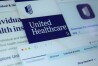 FILE - Pages from the United Healthcare website are displayed on a computer screen, Feb. 29, 2024, in New York. UnitedHealth says files with personal information that could cover “a substantial portion of people in America” may have been taken in the cyberattack on its Change Healthcare business. The company said Monday, April 22, 2024 after markets closed that it sees no signs that doctor charts or full medical histories were released after the attack. (AP Photo/Patrick Sison, File)