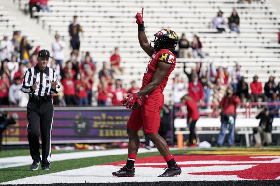 Maryland running back Tayon Fleet-Davis reacts after scoring a touchdown run against Indiana during the first half of an NCAA college football game, Saturday, Oct. 30, 2021, in College Park, Md. (AP Photo/Julio Cortez)