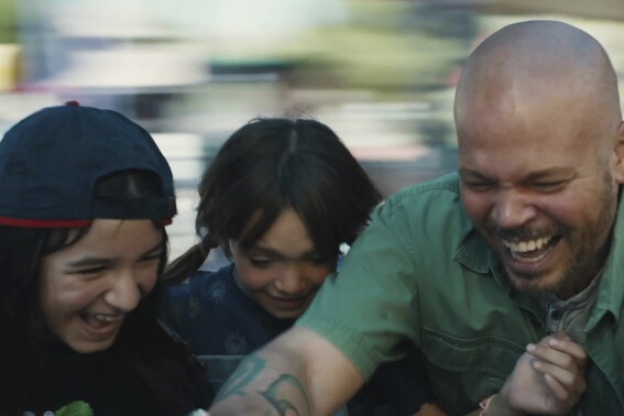 This image released by Sundance Institute shows Residente, right, in a scene from "In The Summers" by Alessandra Lacorazza Samudio, an official selection of the U.S. Dramatic Competition at the 2024 Sundance Film Festival. (Sundance Institute via AP)