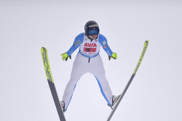 FILE - Norway's Maren Lundby competes in the mixed team ski jumping World Cup event in Rasnov, Romania, on Feb. 20, 2021. Lundby has emerged as an advocate for change in a sport that has historically had athletes develop eating disorders in a quest to be as light as possible to fly farther. (AP Photo/Raed Krishan, File)