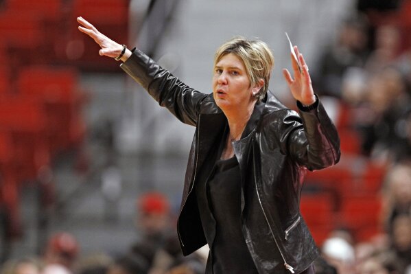 FILE- In this Feb. 18, 2020, file photo, Texas Tech coach Marlene Stollings reacts to a play during the second half of an NCAA college basketball game against Baylor in Lubbock, Texas. Texas Tech women's basketball players have accused Stollings and her staff of fostering a culture of abuse that led to an exodus from the program, according to a report published Wednesday, Aug. 5, 2020, in USA Today.  (AP Photo/Brad Tollefson, File)