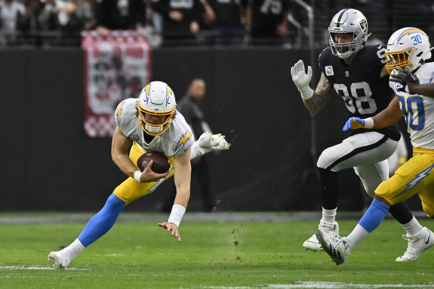 Las Vegas Raiders defensive tackle Bilal Nichols (91) reacts after a  touchdown against the Los Angeles Chargers during the first half of an NFL  football game, Sunday, Dec. 4, 2022, in Las