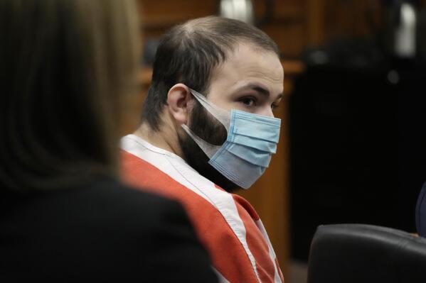 Ahmad Al Aliwi Alissa, accused of killing 10 people at a Colorado supermarket in March, listens during a hearing Tuesday, Sept. 7, 2021, in Boulder, Colo. A judge has ordered a state mental health evaluation for Alissa to determine if he is competent to stand trial. (AP Photo/David Zalubowski/Pool)