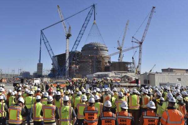 U.S. Secretary of Energy Rick Perry speaks during a press event at the construction site of Vogtle Units 3 and 4 at the Alvin W. Vogtle Electric Generating Plant, Friday, March 22, 2019 in Waynesboro, Ga. Georgia Power Co.’s parent company announced more cost overruns and schedule delays to the project on Thursday, Feb. 17, 2022. (Hyosub Shin/Atlanta Journal-Constitution via AP)