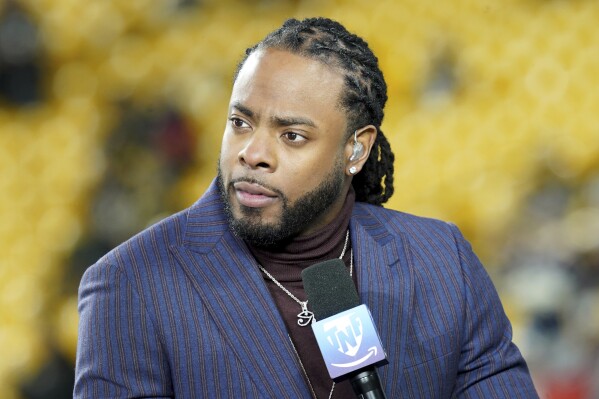 FILE - Host Richard Sherman appears on Amazon Prime's "Thursday Night Football" before an NFL football game between the Pittsburgh Steelers and the New England Patriots, Dec. 7, 2023, in Pittsburgh. Authorities in Washington state said the former NFL player was arrested early Saturday, Feb. 24, 2024, on suspicion of driving under the influence. No other details about the arrest were immediately available. (AP Photo/Matt Freed, File)