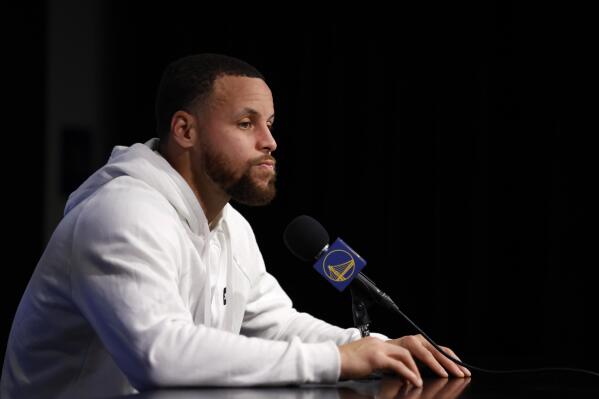 Golden State Warriors' Stephen Curry speaks at a news conference before an NBA basketball game against the Washington Wizards in San Francisco, Monday, Feb. 13, 2023. (AP Photo/Jed Jacobsohn)