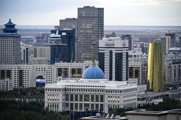 A view of the of Nur-Sultan, the capital of Kazakhstan with at the Presidential Palace in the center, on Monday, Sept. 12, 2022. Kazakh President Kassym-Jomart Tokayev has agreed to restore the former name of the country's capital just three years after he renamed it in honor of his predecessor, his spokesman said Tuesday. (AP Photo/Alexander Zemlianichenko)