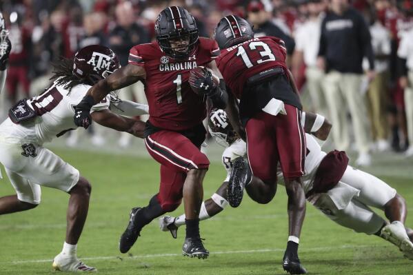 South Carolina running back MarShawn Lloyd (1) breaks free for an 18-yard touchdown during the second half of the team's NCAA college football game against Texas A&M on Saturday, Oct. 22, 2022, in Columbia, S.C. (AP Photo/Artie Walker Jr.)