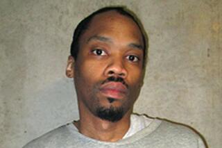 FILE - This Feb. 5, 2018, file photo provided by the Oklahoma Department of Corrections shows Julius Jones. Oklahoma scheduled its first executions Monday, Sept. 20, 2021, since the state put lethal injections on hold six years earlier following a series of mishaps. Included on the list seven executions is Jones, whose case has drawn national attention. The Oklahoma Court of Criminal Appeals scheduled Jones to die on Nov. 18 by lethal injection for the 1999 slaying of Edmond businessman Paul Howell, who was shot in front of his family during a carjacking. (Oklahoma Department of Corrections via AP, File)
