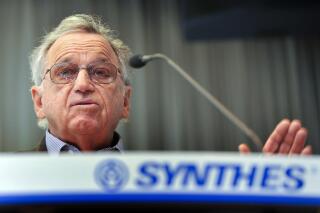 FILE - Chairman Hansjörg Wyss speaks during a press conference of Swiss medical devices maker Synthes Inc, in Oberdorf, Switzerland, Feb. 18, 2009. A fund controlled by Wyss, a Swiss billionaire who has steered tens of millions of dollars to liberal causes, also donated as much as $50,000 to the nonpartisan group Common Cause to advocate for a federal ban on donations like his. David Vance, a spokesman for Common Cause, which advocates to get big money out of politics, confirmed that the group received a donation from the Berger Action Fund, founded by Hansjörg Wyss. (Georgios Kefalas/Keystone via AP, File)