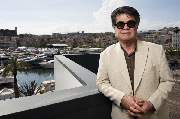 Director Jafar Panahi poses for a portrait photograph for the film 'It Was Just an Accident' at the 78th international film festival, Cannes, southern France, Wednesday, May 21, 2025. (Photo by Scott A Garfitt/Invision/AP)