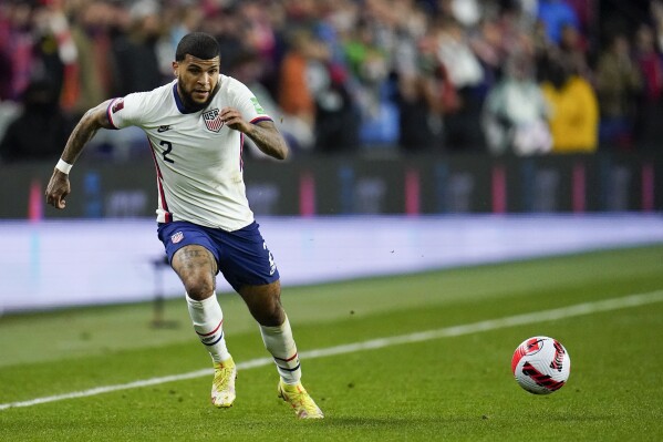 FILE - United States' DeAndre Yedlin chases the ball during the first half of a FIFA World Cup qualifying soccer match between Mexico and the United States, Friday, Nov. 12, 2021, in Cincinnati. Yedlin, who has been to a pair of World Cups with the United States, was traded from Inter Miami to Cincinnati earlier this week for $172,799 in 2024 general allocation money. He leaves a team led by superstar Lionel Messi, but he joins another that last season won 20 games and earned the Supporters' Shield. (AP Photo/Julio Cortez, File)