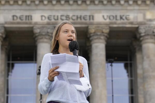 FILE --Swedish climate activist Greta Thunberg holds a speech during a Fridays for Future global climate strike in front of a parliament building in Berlin, Germany, Friday, Sept. 24, 2021. Climate activist Greta Thunberg says it would be “a mistake” for Germany to switch off its nuclear power plants if that means burning more planet-heating coal.  (AP Photo/Michael Sohn,file)