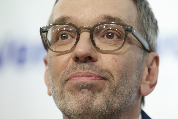 The leader of Austria's Freedom Party, Herbert Kickl, addresses a news conference, in Vienna, Austria, Tuesday, Jan 7, 2025. (AP Photo/Heinz-Peter Bader)
