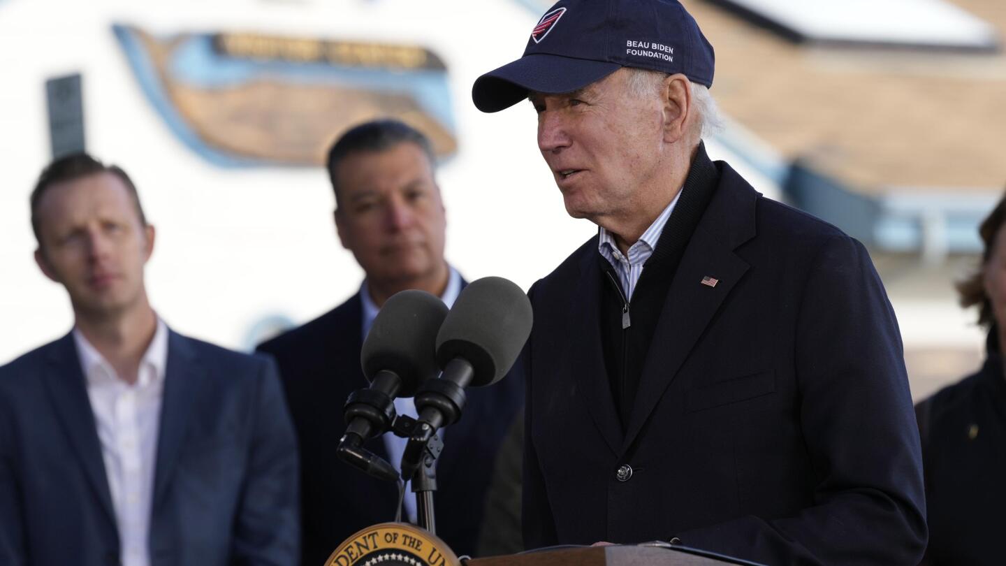 Biden tours beach town damaged by massive California storms