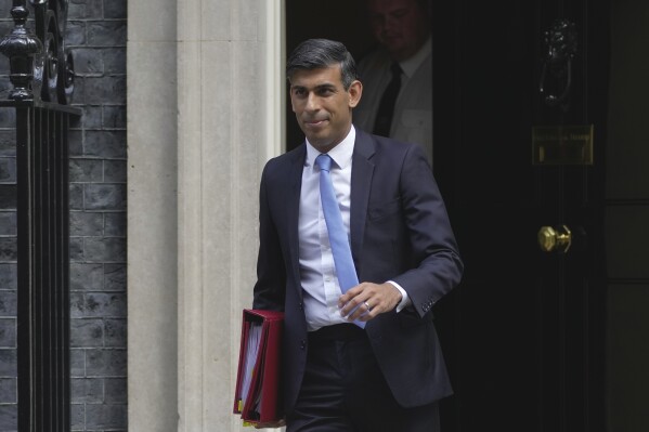 Britain's Prime Minister Rishi Sunak leaves 10 Downing Street to go to the House of Commons for his weekly Prime Minister's Questions in London, Wednesday, Sept. 6, 2023. (AP Photo/Kin Cheung)