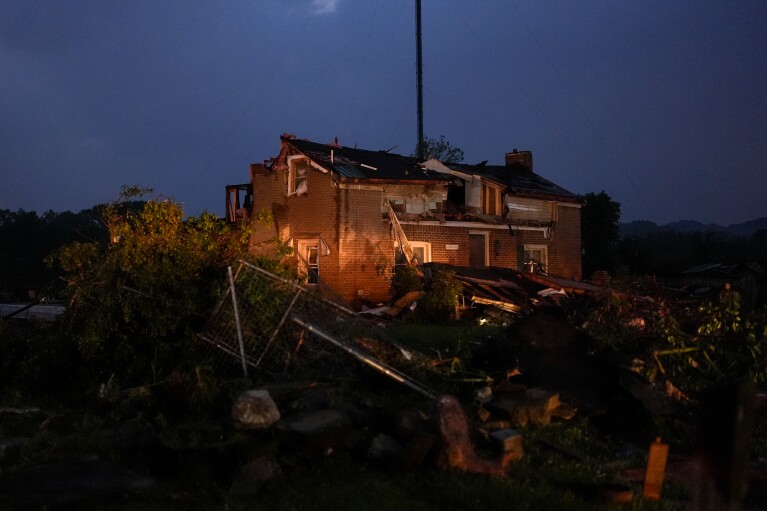 A home damaged by severe weather is pictured Wednesday, May 8, 2024, in Columbia, Tenn. (AP Photo/George Walker IV)