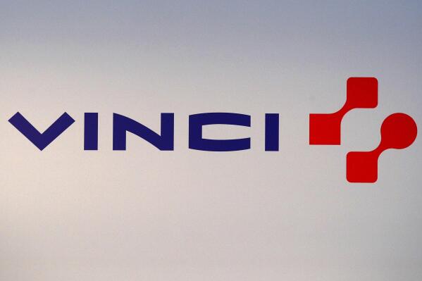 FILE - The logo of Vinci Group is pictured during the full year 2017 results presentation in Paris, Thursday, Feb. 8, 2018. French construction company Vinci said on Monday Nov.7, 2022 that one of its subsidiaries has been summoned by an investigating judge to answer charges that it did not respect the rights of migrant workers who were hired to build infrastructure for the World Cup in Qatar. (AP Photo/Francois Mori, File)