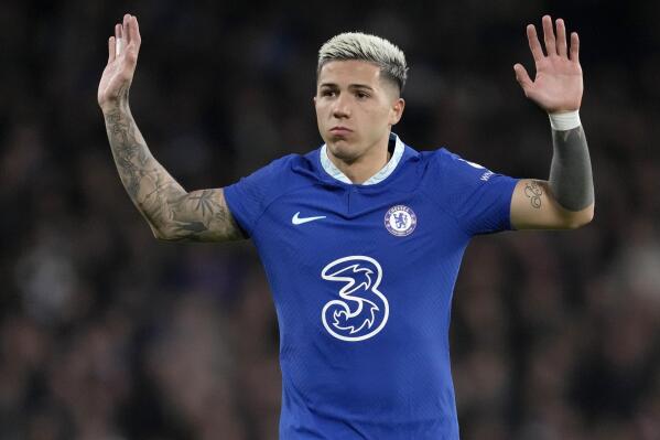 Chelsea's new signing Enzo Fernandez gestures before the English Premier League soccer match between Chelsea and Fulham at Stamford Bridge stadium in London, Friday, Feb. 3, 2023. (AP Photo/Kirsty Wigglesworth)