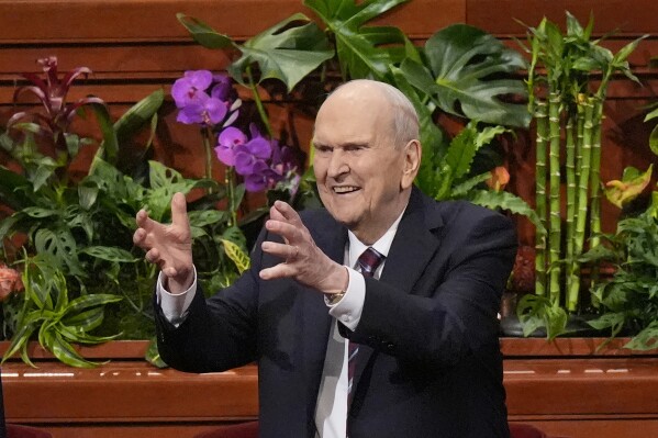 President Russell M. Nelson gestures during The Church of Jesus Christ of Latter-day Saints conference Sunday, April 7, 2024, in Salt Lake City. (AP Photo/Rick Bowmer)