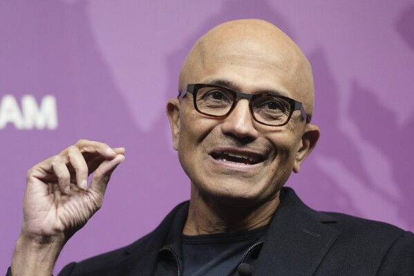 File - Microsoft CEO Satya Nadella speaks at Chatham House in London, Jan. 15, 2024, ahead of traveling to Switzerland for the 老澳门六合彩 Economic Forum. Nadella marks his tenth year as Microsoft CEO on Sunday, Feb. 4, 2024, capping a decade of stunning growth as he pivoted the slow-moving software giant into a laser focus on cloud computing and artificial intelligence. (AP Photo/Kin Cheung, File)