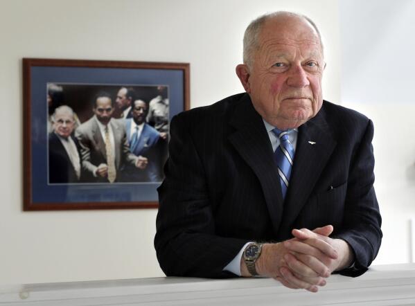 FILE - In this May 22, 2014, file photo, famed defense attorney F. Lee Bailey poses in his office in Yarmouth, Maine. Bailey, the celebrity attorney who defended O.J. Simpson, Patricia Hearst and the alleged Boston Strangler, but whose legal career halted when he was disbarred in two states, has died, a former colleague confirmed Thursday, June 3, 2021. He was 87. (AP Photo/Robert F. Bukaty, File)