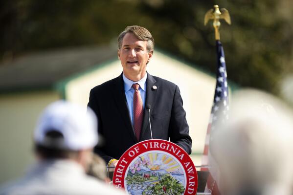 Gov. Glenn Youngkin speaks at the National Center for Healthy Veterans in Altavista, Va. before his wife, first lady of Virginia Suzanne Youngkin, presents the inaugural Spirit of Virginia Award on Monday, March 21, 2022. (Kendall Warner/The News & Advance via AP)