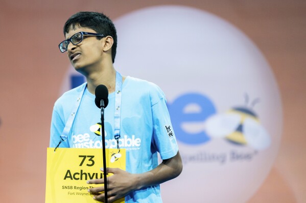 Achyut Ethiraj, 14, of Fort Wayne, Ind., reacts to misspelling his word during the quarterfinal round of competition in the Scripps National Spelling Bee, in Oxon Hill, Md., Wednesday, May 29, 2024. (AP Photo/Nathan Howard)