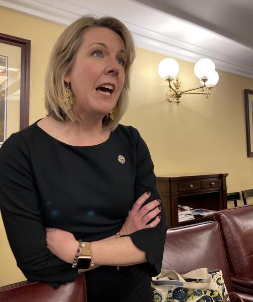 Ohio House Minority Leader Allison Russo speaks to reporters after a meeting of the Ohio Redistricting Commission on Wednesday, Feb. 23, 2022, at the Ohio Statehouse in Columbus, Ohio. (AP Photo/Julie Carr Smyth)