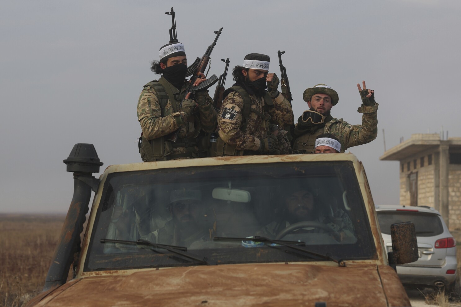 In a shock offensive, insurgents breach Syria's largest city for the first  time since 2016 | AP News