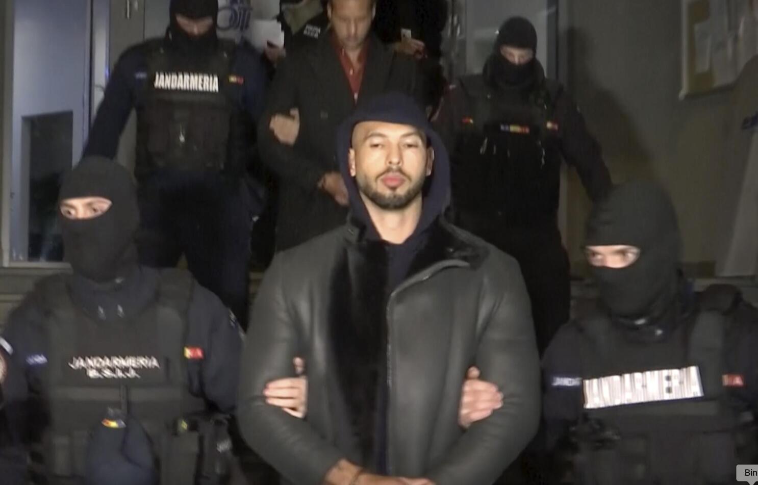 Divisive social media star Andrew Tate detained in Romania | AP News