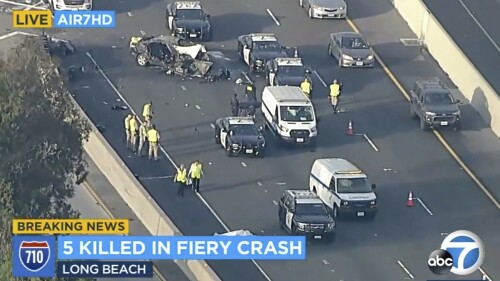 This aerial image taken from video provided by ABC7 Los Angeles shows the scene of a crash on Interstate 710 in north Long Beach, Calif., Monday, June 26, 2023. Five people were killed and one was injured in the fiery single-vehicle crash on a Southern California freeway early Monday, authorities said. (ABC7 Los Angeles via AP)