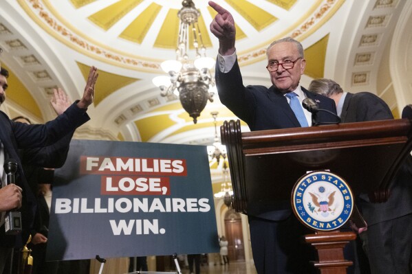 Senate Minority Leader Chuck Schumer of N.Y., calls on a reporter, Feb. 19, 2025, after a Senate policy luncheon on Capitol Hill in Washington. (AP Photo/Jacquelyn Martin, File)