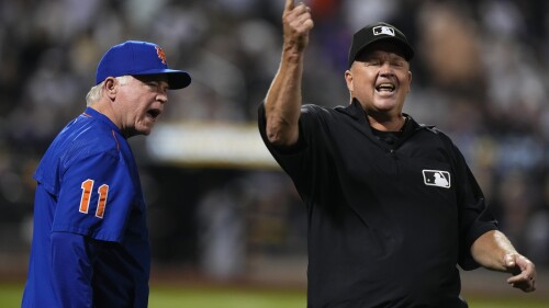 First base umpire Ron Kulpa ejects New York Mets manager Buck Showalter during the eighth inning of a baseball game against the Milwaukee Brewers Wednesday, June 28, 2023, in New York. (AP Photo/Frank Franklin II)