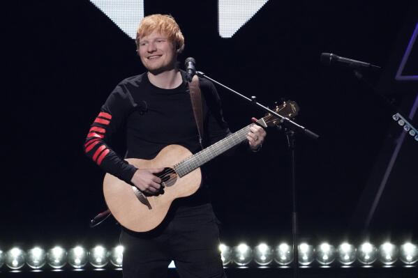 FILE - Ed Sheeran performs at Z100's iHeartRadio Jingle Ball on Dec. 10, 2021, in New York. Jury selection and opening statements are expected to begin Monday, April 24, 2023, in a trial that mashes up Ed Sheeran's “Thinking Out Loud” with Marvin Gaye's “Let's Get It On.” (Photo by Charles Sykes/Invision/AP, File)